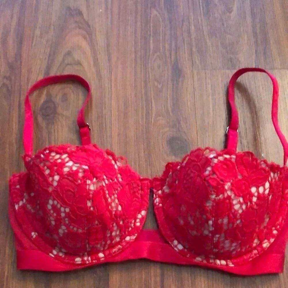 Victoria’s Secret lace and crochet red Demi cup bra size 32D.